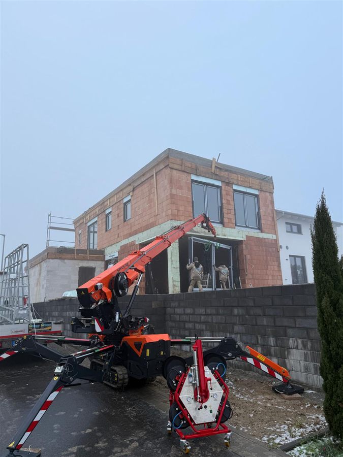 Montage eines Fensters mit Glashebeger&auml;t